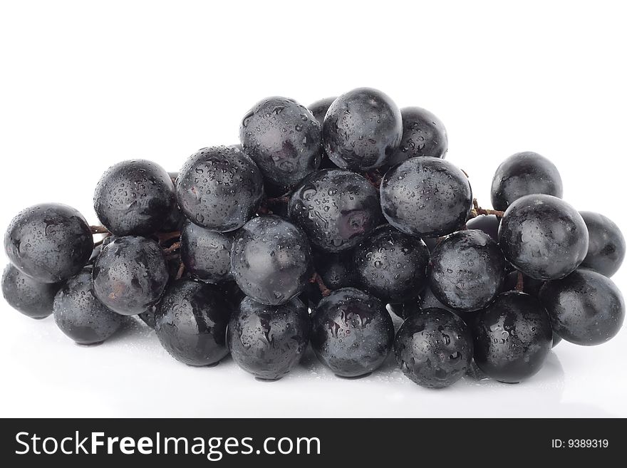 Grapes closeup isolated over white background. Grapes closeup isolated over white background