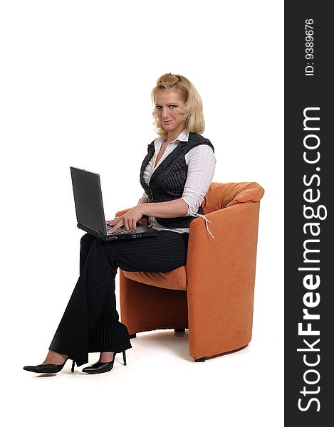 Woman with a notebook in a chair