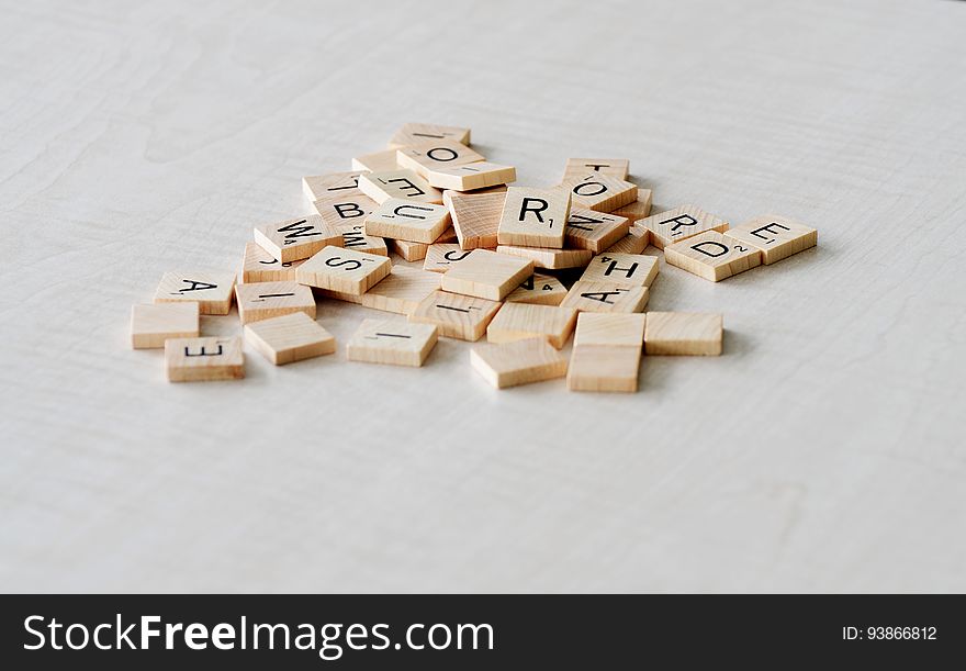 A pile of Scrabble letters.