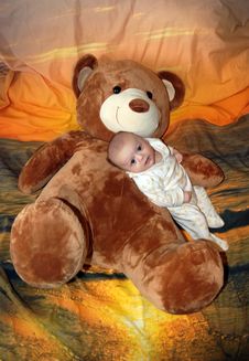 Infant Baby Boy With Bear Royalty Free Stock Photography