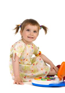 Cute Little Girl And Toy Laptop Royalty Free Stock Images