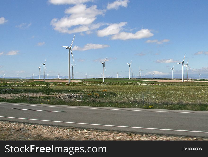 Wind turbines against the sky in fields of Spain. Wind turbines against the sky in fields of Spain