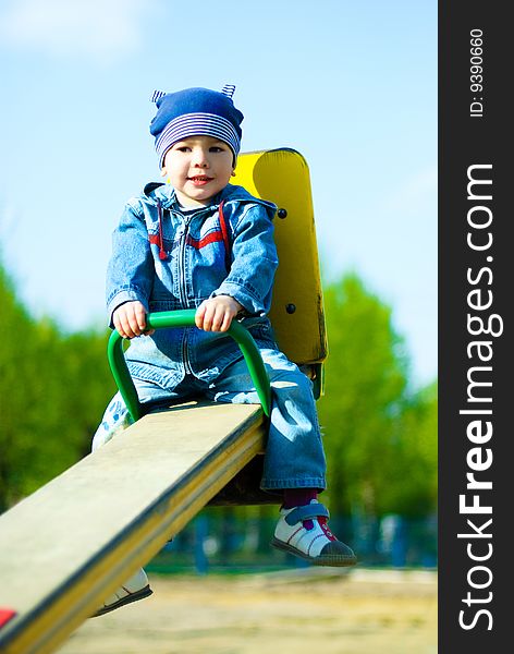 Cute three year old boy having fun in the park outdoor. Cute three year old boy having fun in the park outdoor