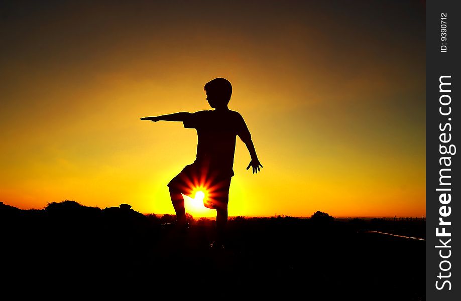 Silhouette of my son at sunset