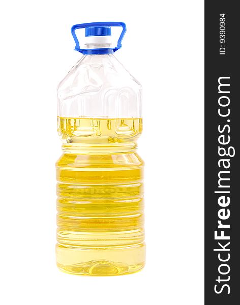 Bottle of sunflower-seed oil of yellow colour, natural, on a white background.