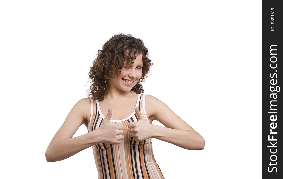 Girl showing thumbs up on white background. Woman looking into the camera while giving an ok gesture with her forward hand. Happiness woman shows OK. Isolated over white background. Girl showing thumbs up on white background. Woman looking into the camera while giving an ok gesture with her forward hand. Happiness woman shows OK. Isolated over white background.