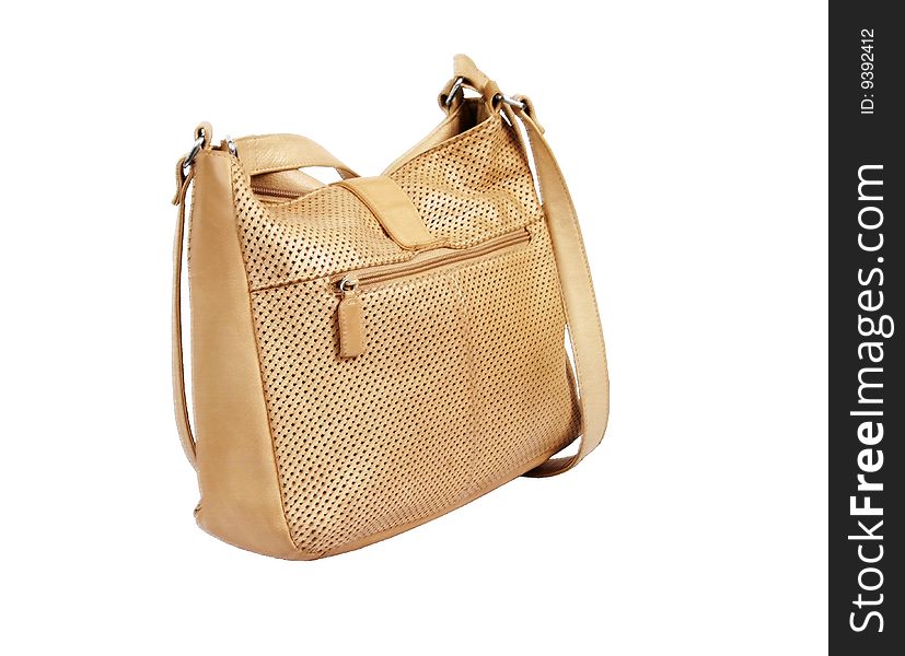 A tan leather handbag on white background with clipping path
