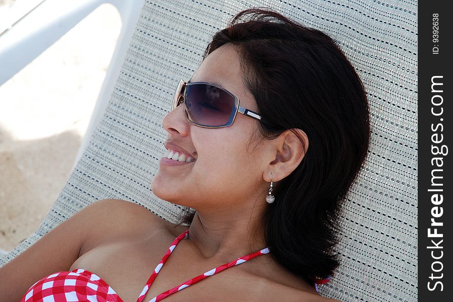 The girl having good time on Cozumel island beach, Mexico. The girl having good time on Cozumel island beach, Mexico.