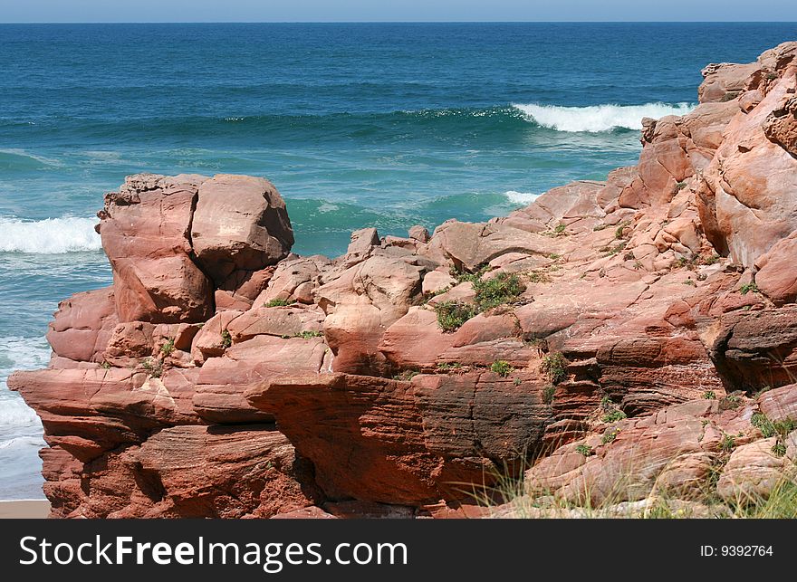 Red rocks on the coast. Red rocks on the coast