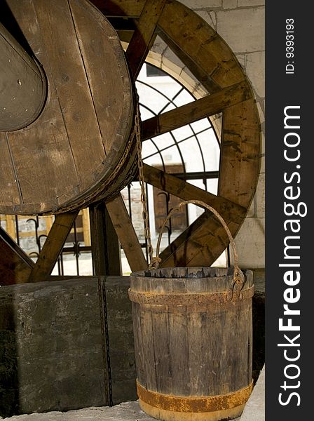 Old wooden well and bucket