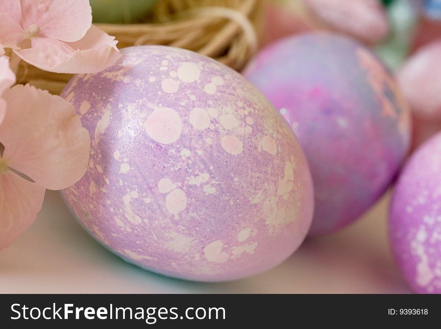 Composition of colorful eggs on the table