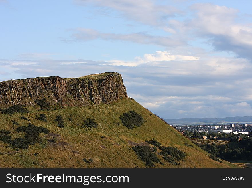 The arthur seat next to the city of Edinburgh ,Scotland.