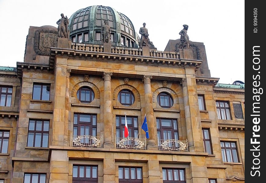 Detail of a Prague house with Czech national flag and European Union flag. Detail of a Prague house with Czech national flag and European Union flag