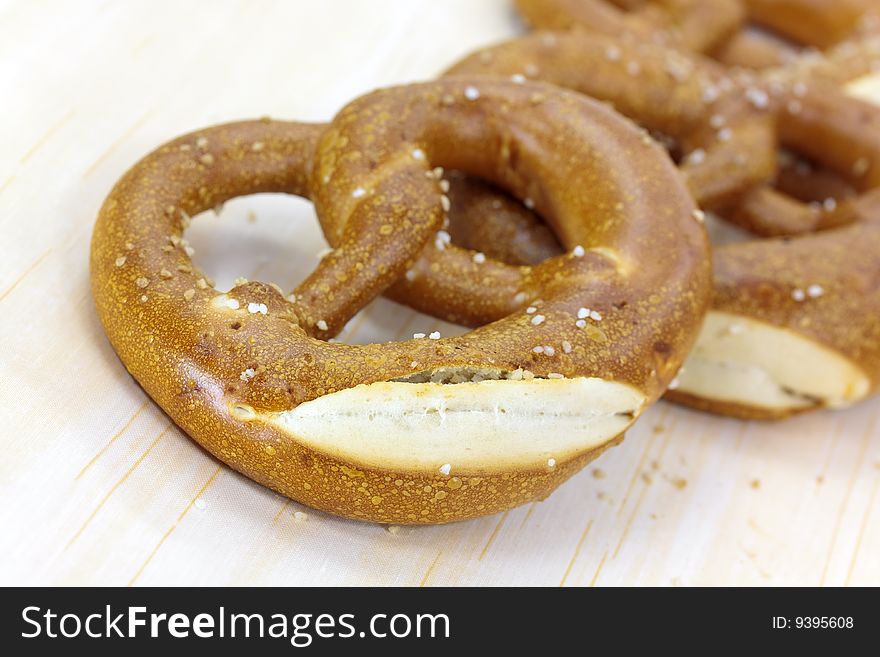 Fresh pretzel isolated on white.