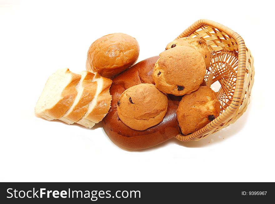 Assortment of baked bread on white