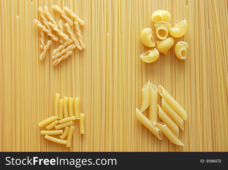 Four different kinds of italian pasta. Food background