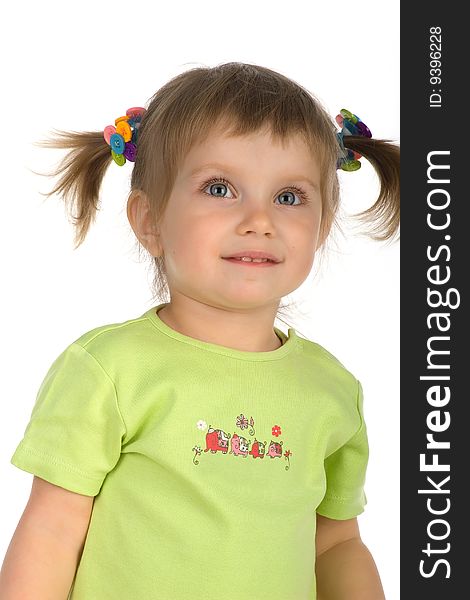 Cute little girl on a white background close-up