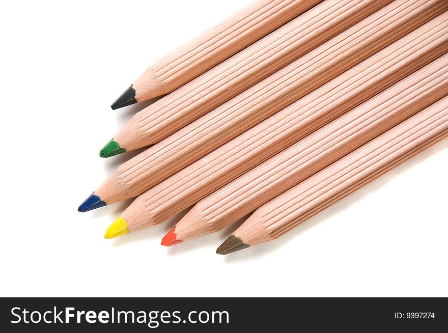 Six wooden pencils isplated over white. Six wooden pencils isplated over white