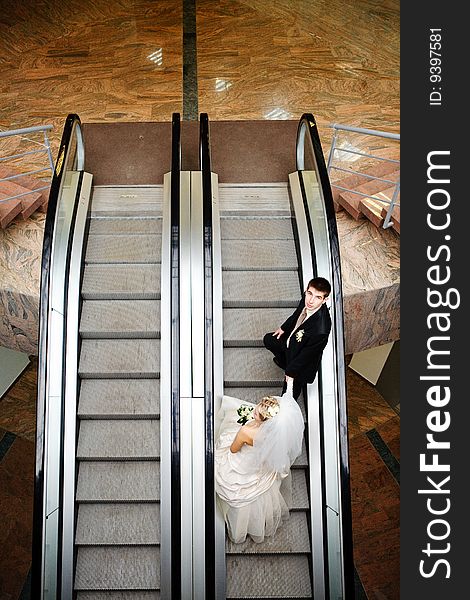 Bride and groom in metro
