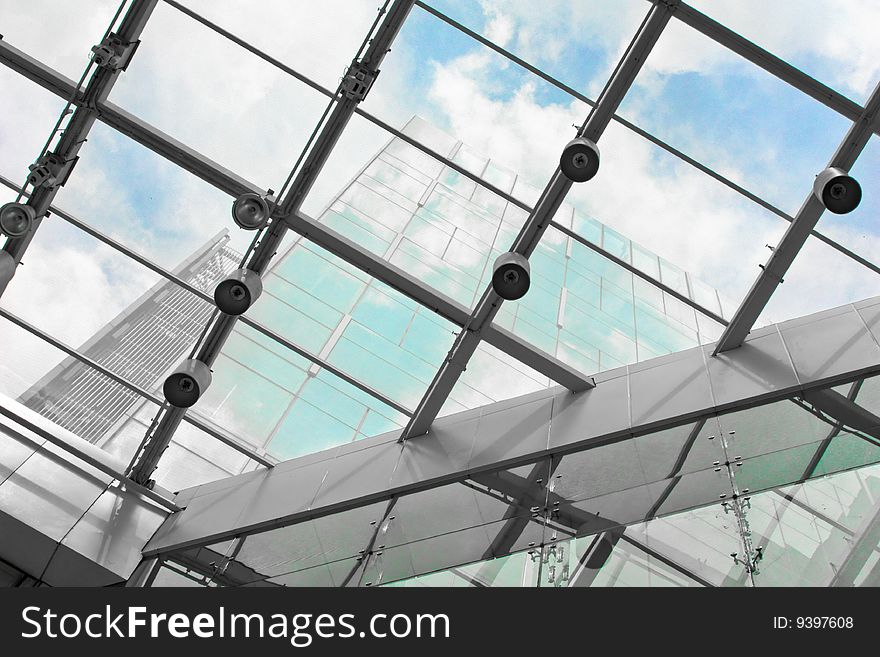 A modern building under a glass structure