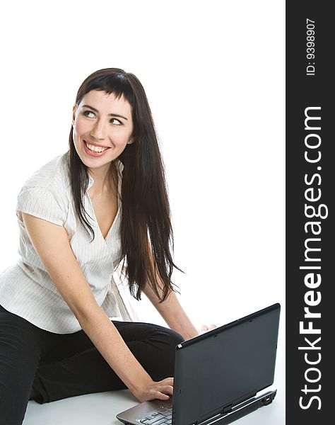 Young woman with laptop. Isolated on white background