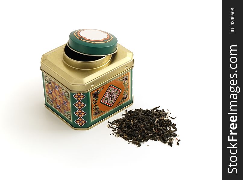Ornamental tin can with tea isolation
