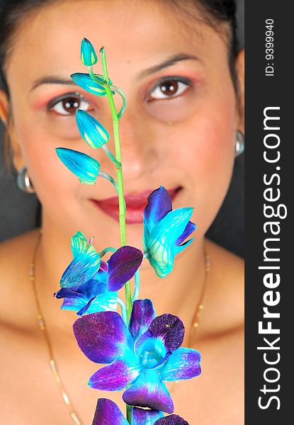 Smiling Girl With Voilet Flowers