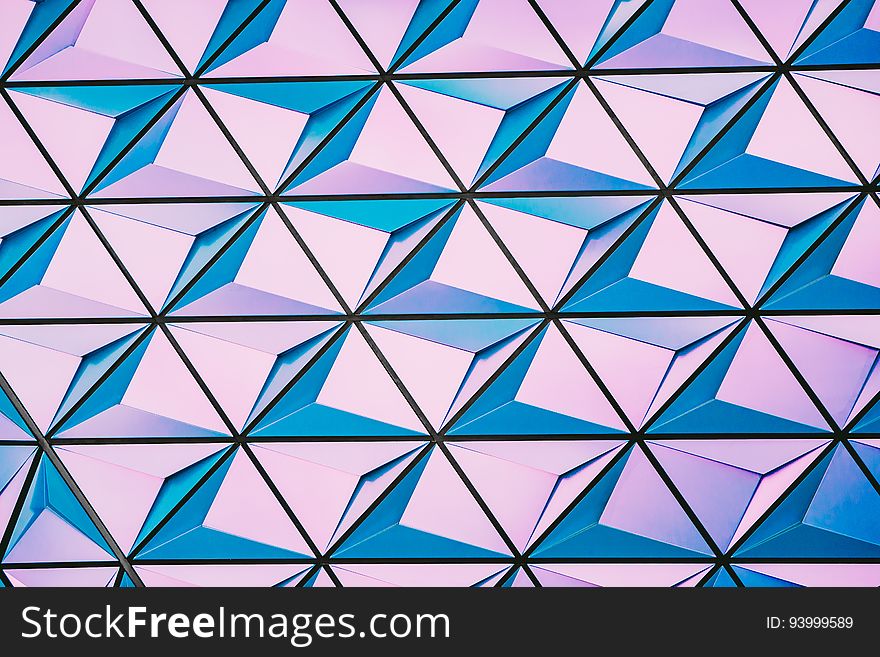Abstract geometric 3D cube patterns in pink and blue. Abstract geometric 3D cube patterns in pink and blue.