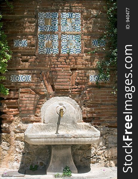 Drinking Fountain in Roman Quarter, Tarragona, Spain.