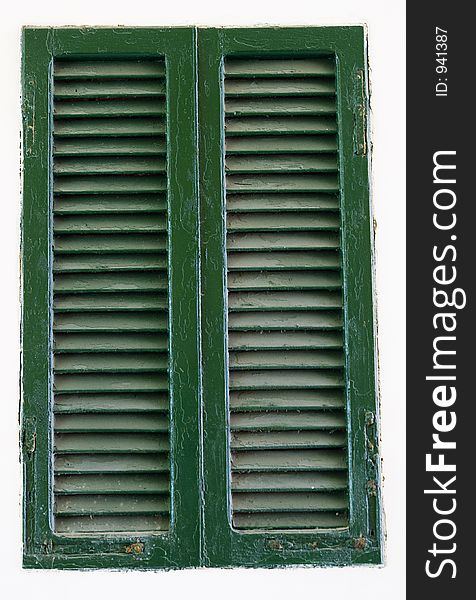 Close up of an old wooden green window