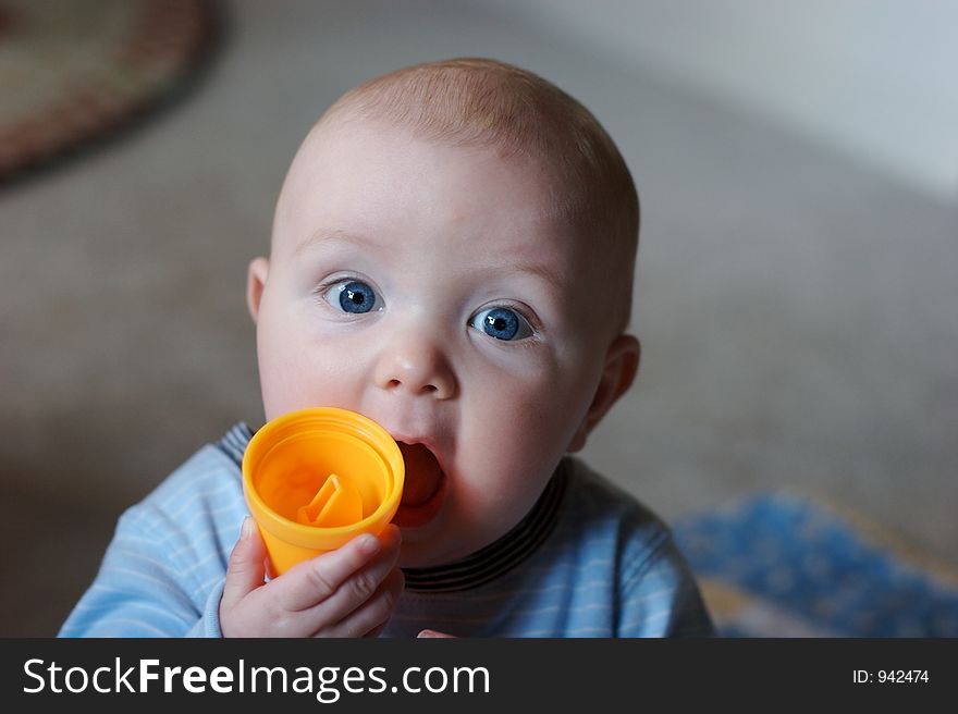Toddler Boy Teething With Sippy Cup