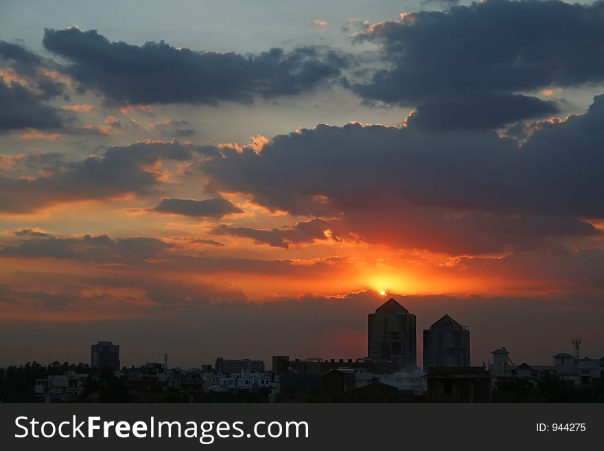 Silhouetted tower sunset in gurgaon india. Silhouetted tower sunset in gurgaon india