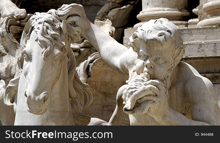 A Triton and Seahorse in the Trevi Fountain in Rome