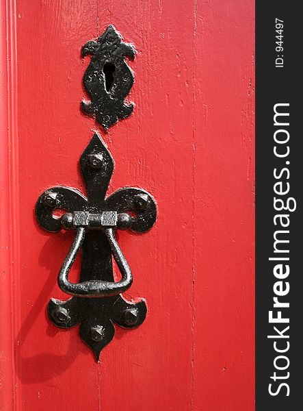 Beautiful old door handle and key hole on a church door in Northumberland, England. Beautiful old door handle and key hole on a church door in Northumberland, England