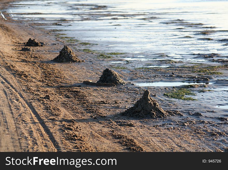 Sand figures on the sea coast. Sand figures on the sea coast