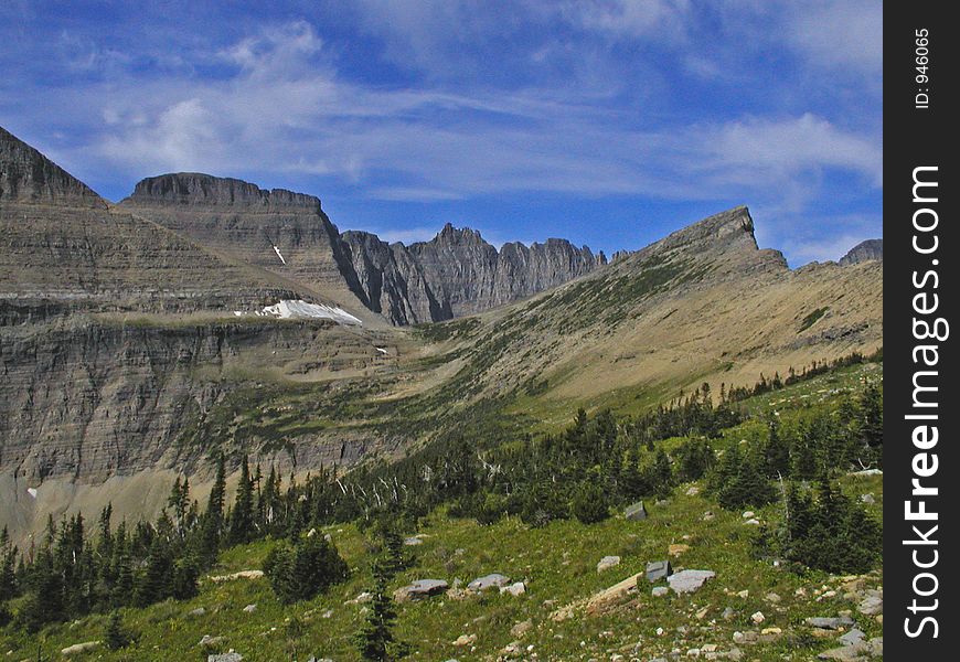 This picture shows part of the backside of the Garden Wall and one of the outstanding hiking passes in Glacier National Park. This picture shows part of the backside of the Garden Wall and one of the outstanding hiking passes in Glacier National Park.