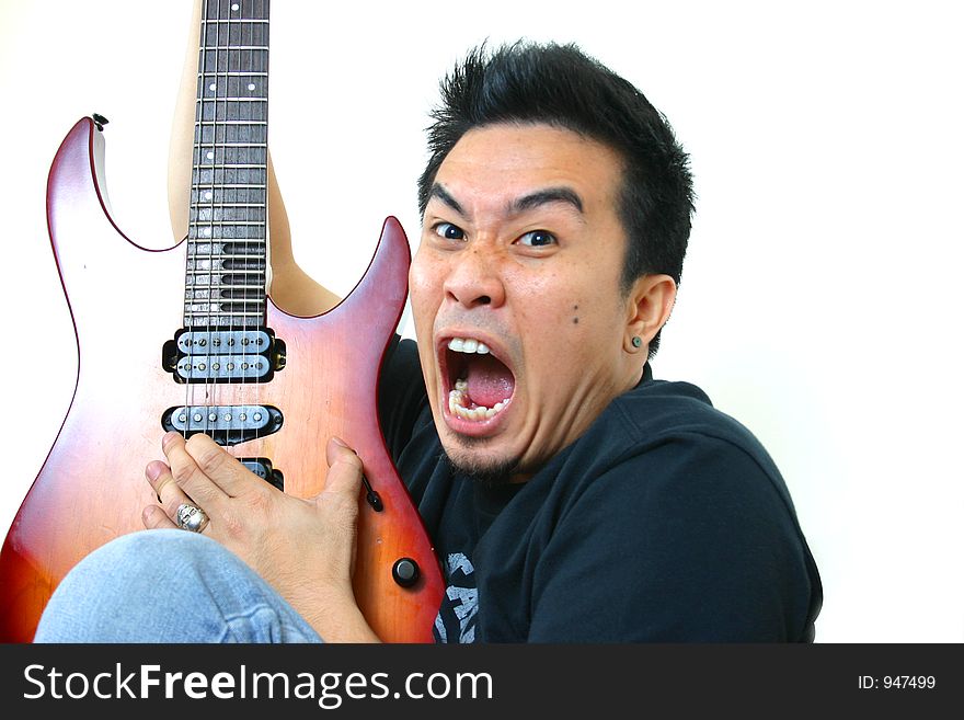 Close-up young man with guitar. Close-up young man with guitar.