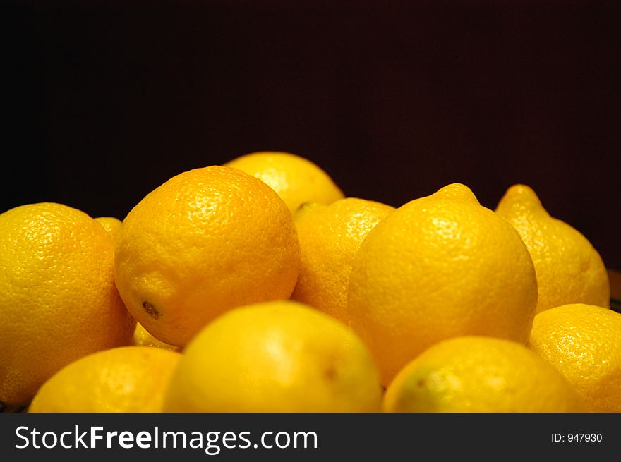 Lemons against black