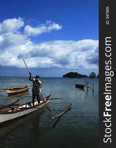 Fisherman coming home from a fishing trip. Fisherman coming home from a fishing trip