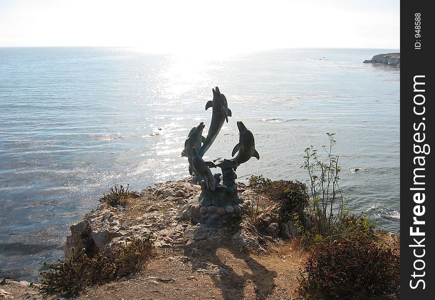 Dolphin Statue By The Sea