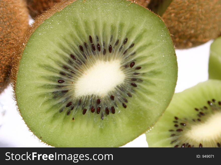 A delicious ripe kiwi fruit sliced open.