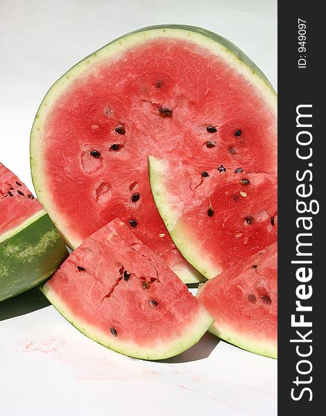 Slices of juicy watermelon on a white background. Slices of juicy watermelon on a white background.