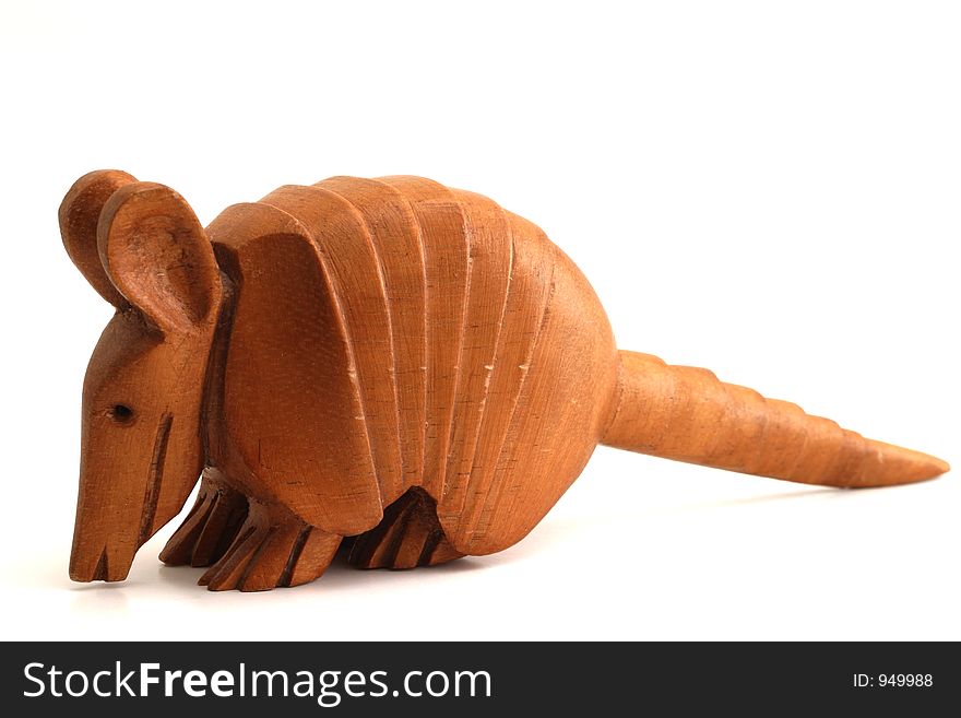 Wooden armadillo carving isolation