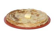 Russian Pancakes On The Red Plate (isolated) Royalty Free Stock Image Russian Pancakes On The Red Plate (isolated) Royalty Free Stock Image