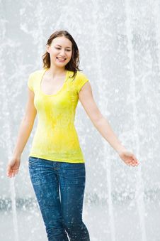 Young Caucasian Girl Playing At Fountain Stock Photography