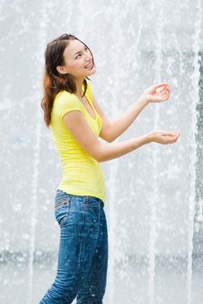 Young Caucasian Girl Playing At Fountain Stock Images