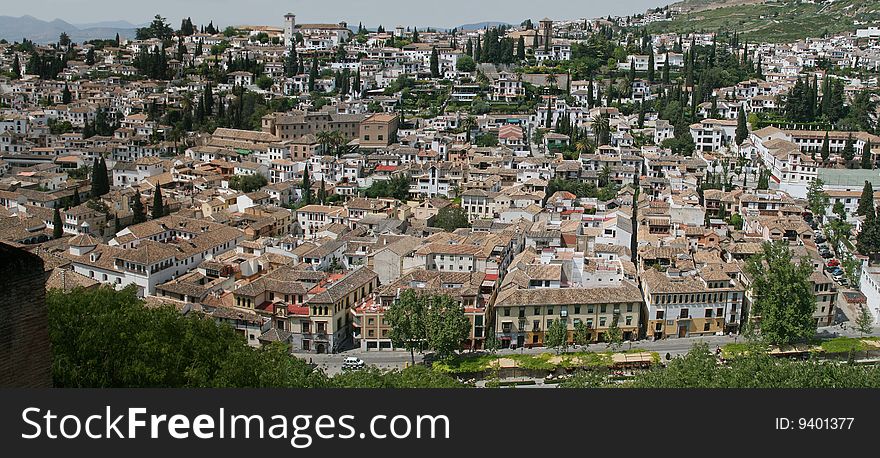 Old part of the city of Granada, Spain. A kind from a hill. Old part of the city of Granada, Spain. A kind from a hill