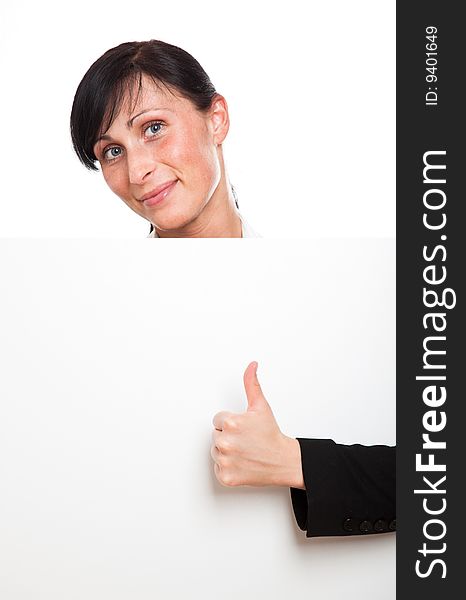 Friendly thumb woman behind copy-space billboard. Friendly thumb woman behind copy-space billboard