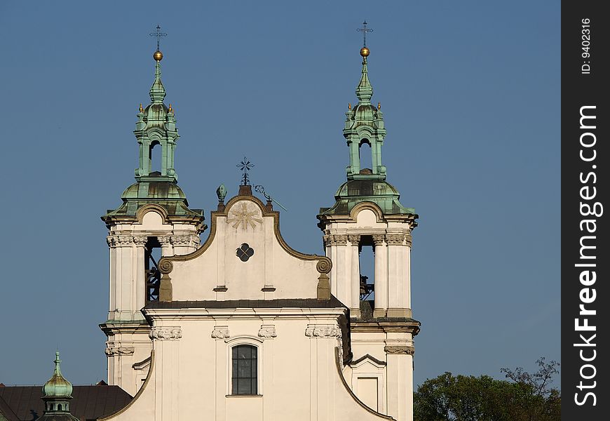 Skałka, which means a small rock in Polish, is a small hillock in Kraków where the Bishop of Krakow saint Stanislaus of Szczepanów was slain by order of Polish king Bolesław II the Bold in 1079. This action resulted in the king's exile and the eventual canonization of the slain bishop. The crypt underneath the church serves as a national Panthéon, a burial place for some of the most distinguished Poles, particularly those who lived in Kraków. Skałka, which means a small rock in Polish, is a small hillock in Kraków where the Bishop of Krakow saint Stanislaus of Szczepanów was slain by order of Polish king Bolesław II the Bold in 1079. This action resulted in the king's exile and the eventual canonization of the slain bishop. The crypt underneath the church serves as a national Panthéon, a burial place for some of the most distinguished Poles, particularly those who lived in Kraków.