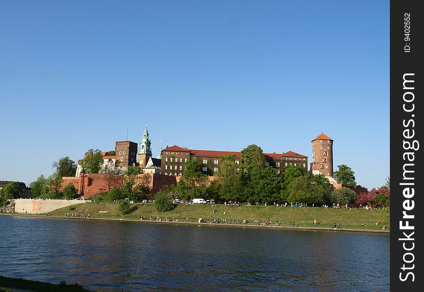 Wawel is an outcrop on the left bank of the Vistula River in KrakÃ³w, Poland.  This is a place of great significance for the Polish people. The Royal Castle with an armoury and the Cathedral are situated on the hill. Polish Royalty and many distinguished Poles are interred in the Wawel Cathedral. Royal coronations took place there also. Wawel is an outcrop on the left bank of the Vistula River in KrakÃ³w, Poland.  This is a place of great significance for the Polish people. The Royal Castle with an armoury and the Cathedral are situated on the hill. Polish Royalty and many distinguished Poles are interred in the Wawel Cathedral. Royal coronations took place there also.